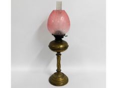 A Victorian brass oil lamp with period etched cran