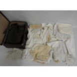 A quantity of linen & lace twinned with case & kit