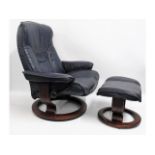 A blue Ekornes Stressless reclining armchair with