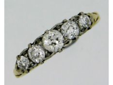 An 18ct gold five stone ring set with approx. 0.6c