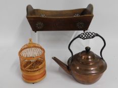 A novelty wooden clockwork bird in cage, a carved