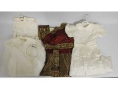 A hand made Thai dress, a first communion gown & c