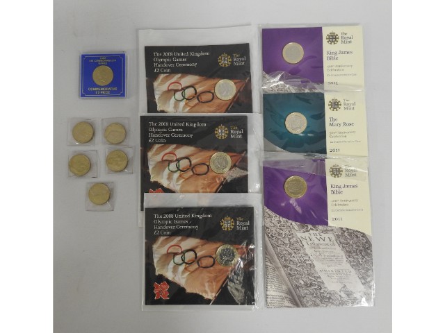A quantity of £2 coins, some in collectors packs