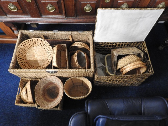 A large quantity of wicker ware including a laundr