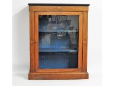 A 19thC. display cabinet with ebonised trim & inla