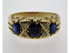 A 9ct gold ring set with diamond & sapphire, 4.1g,