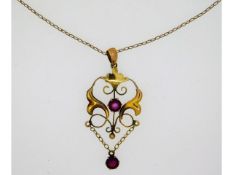 An Edwardian pendant, 46mm drop, set with garnets