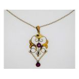 An Edwardian pendant, 46mm drop, set with garnets