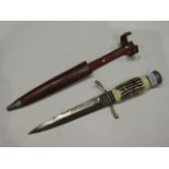 A mid/late 20thC. dagger with faux horn handle