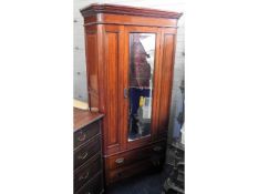 A mahogany wardrobe with mirror, 78in high x 39in