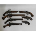 Seven reproduction flintlock & similar pistols