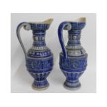 Two c.1900 German stoneware ewers, one with restor