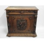 A 19thC. oak chest with unusual carved fish & serp