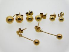 Four pairs of 9ct gold earrings, one back missing,