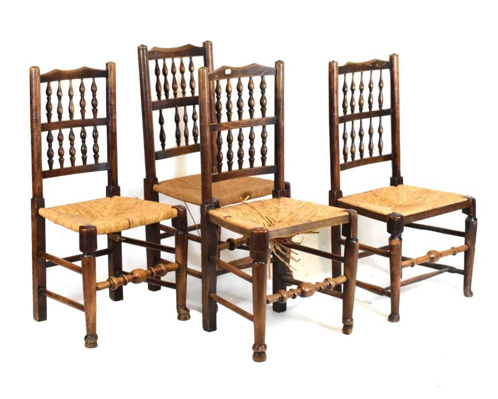 Set of four oak spindle back chairs