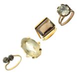 Four 9ct stone set dress rings