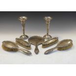 George V silver five-piece dressing table set together with a pair of Indian white metal bud vases