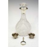 George V silver mounted cut glass decanter, pair salts, and a silver-handled magnifying glass