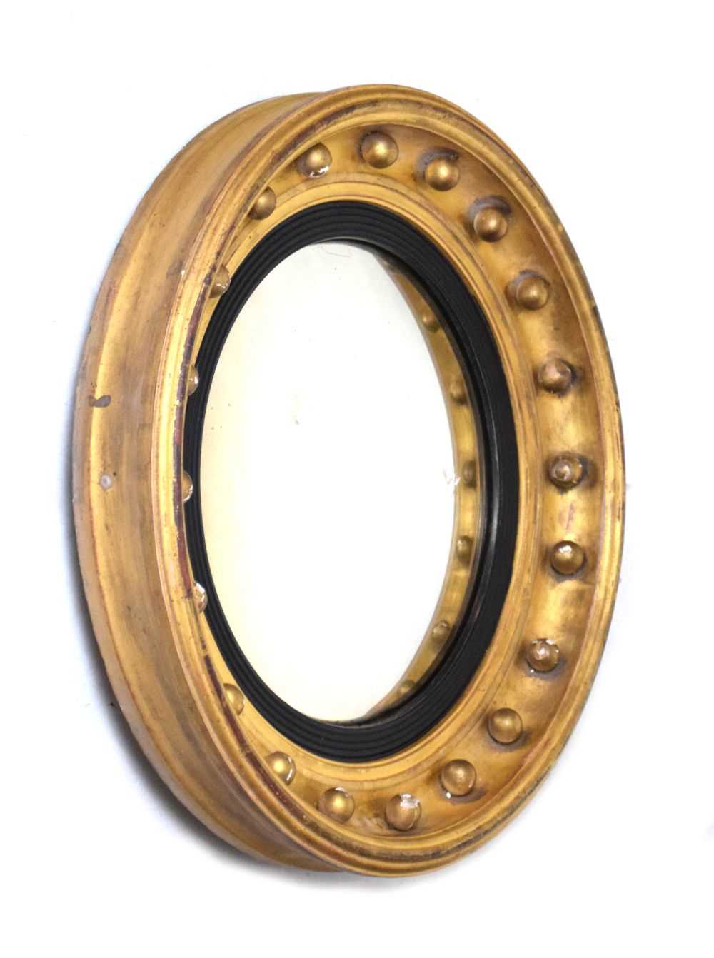 19th Century giltwood convex wall mirror