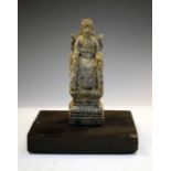 Carved soapstone seated figure