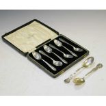 Cased set of six George V silver teaspoons together with a pair of American teaspoons