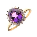9ct gold cluster ring set oval cut amethyst, and diamonds