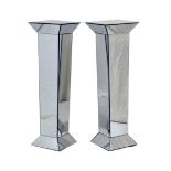 Tall pair of mirror glass pedestals