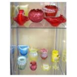 Assorted coloured glassware