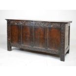 Late 17th Century oak four-panel coffer, with carved decoration