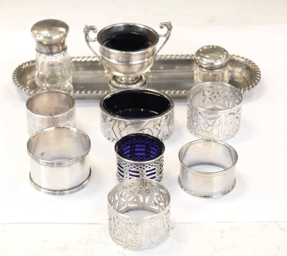 Quantity of silver items to include napkin rings, pen tray, etc
