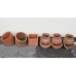 Quantity of terracotta chimney tops, grown toppers, etc