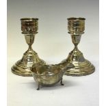 Silver sauceboat and pair of candlesticks