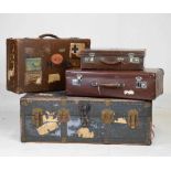 Three vintage suitcases and trunk