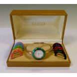 Gucci lady's bracelet watch, with ten separate interchangeable bezels,