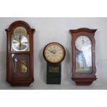 Three modern reproduction wall clocks