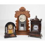 Three mantel clocks