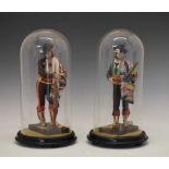 Pair of Spanish terracotta figures beneath glass domes, Jose Cubero, Malaga