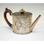 George III silver teapot with later embossed rococo decoration