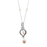 Cultured pearl and diamond pendant