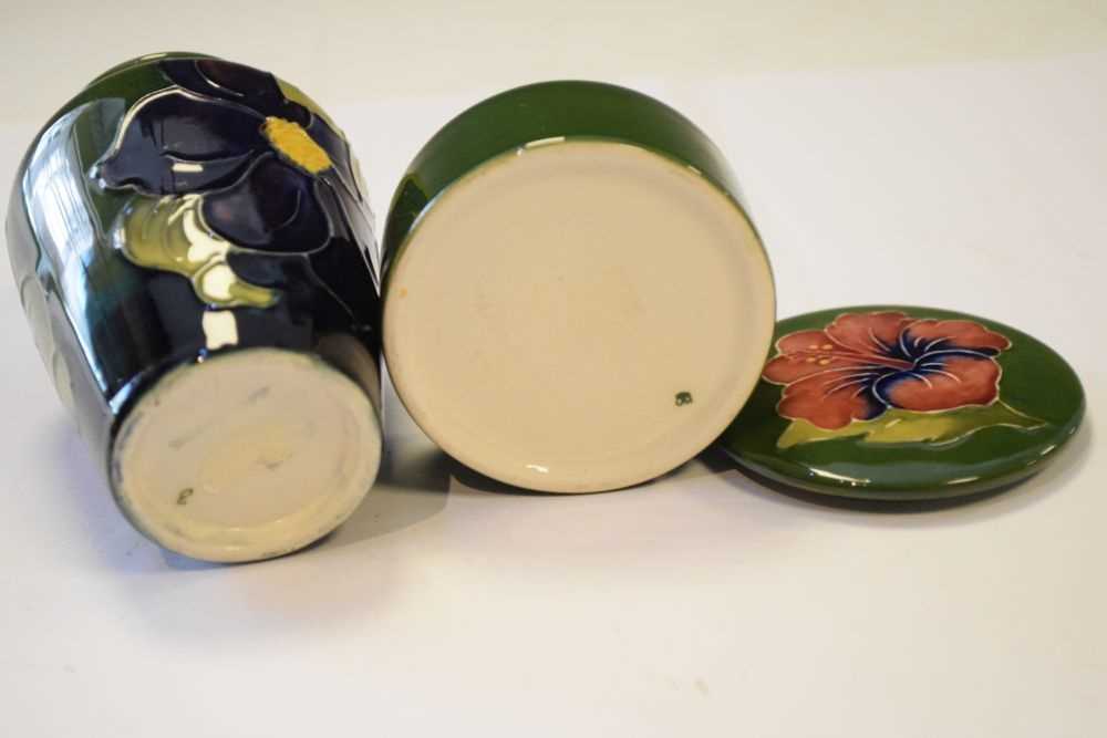 Moorcroft - Pair of Hibiscus pattern candlesticks, vase and lidded pot - Image 7 of 7