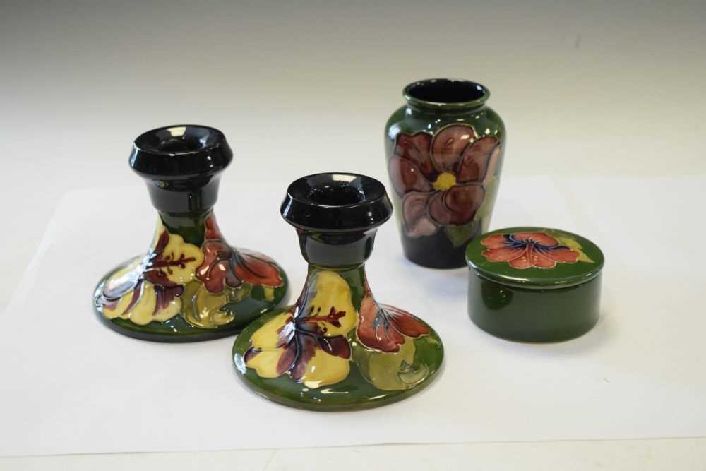 Moorcroft - Pair of Hibiscus pattern candlesticks, vase and lidded pot - Image 2 of 7