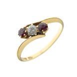 Ruby and diamond three-stone crossover ring