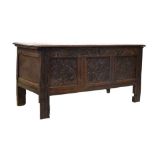 Oak coffer with three carved panels