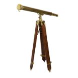 Reproduction brass telescope on a tripod stand