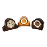 Three mantel clocks