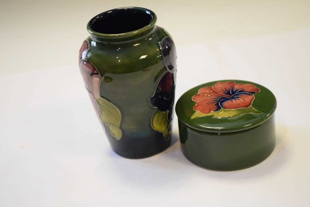 Moorcroft - Pair of Hibiscus pattern candlesticks, vase and lidded pot - Image 5 of 7