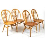 Set of four Ercol light Windsor style chairs