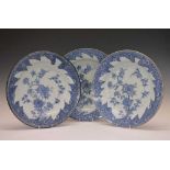 Set of three Chinese blue and white chargers with foliate design centres