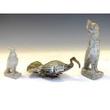Two Egyptian soapstone 'Horus' bird God figures, together with a soapstone bird