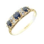 Yellow metal (18ct) seven-stone sapphire and diamond ring, 2.9g gross approx